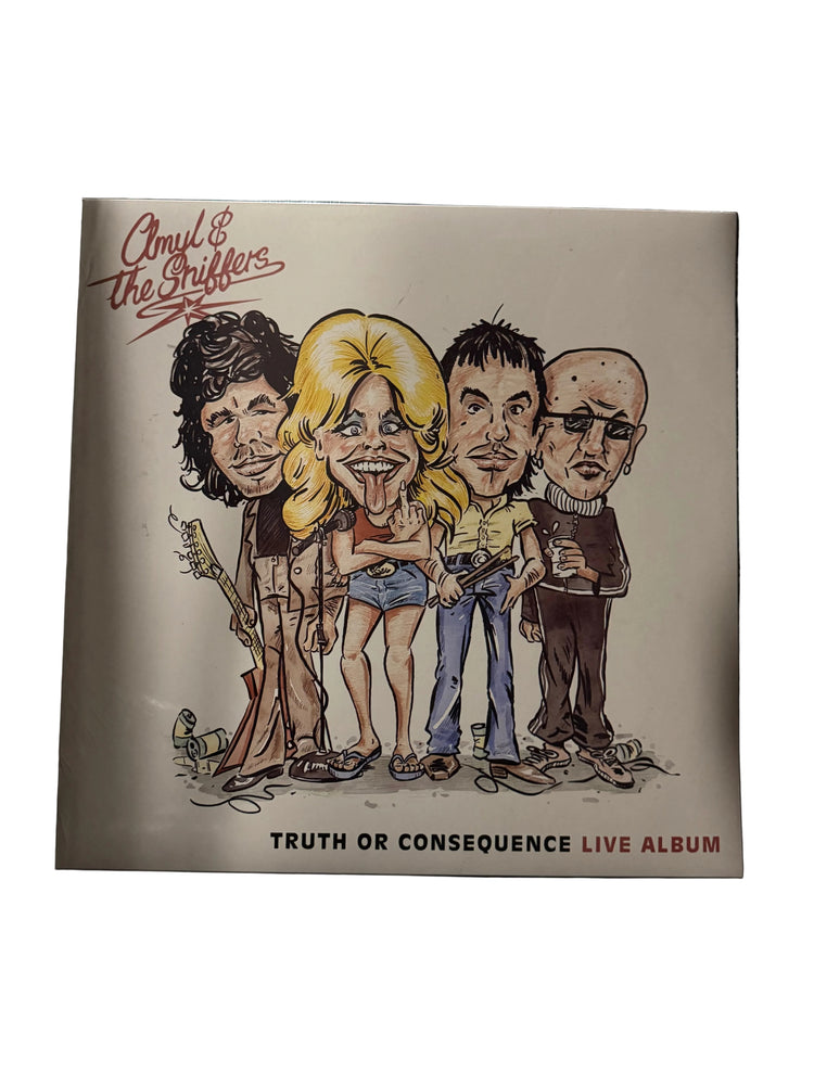Amyl & The Drifters 'Truth or Consequence Live Album' vinyl record sleeve, featuring a cartoon caricature illustration of the band members, photographed on a dark textured surface.