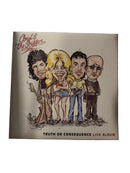 Amyl & The Drifters 'Truth or Consequence Live Album' vinyl record sleeve, featuring a cartoon caricature illustration of the band members, photographed on a dark textured surface.