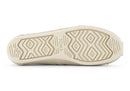A women's Toms Alpargata slip-on shoe with a champagne metallic suede upper and a beige canvas footbed.