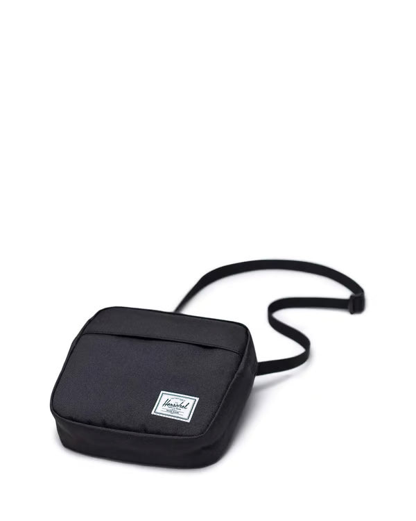 Black crossbody bag with a visible brand logo on a white background