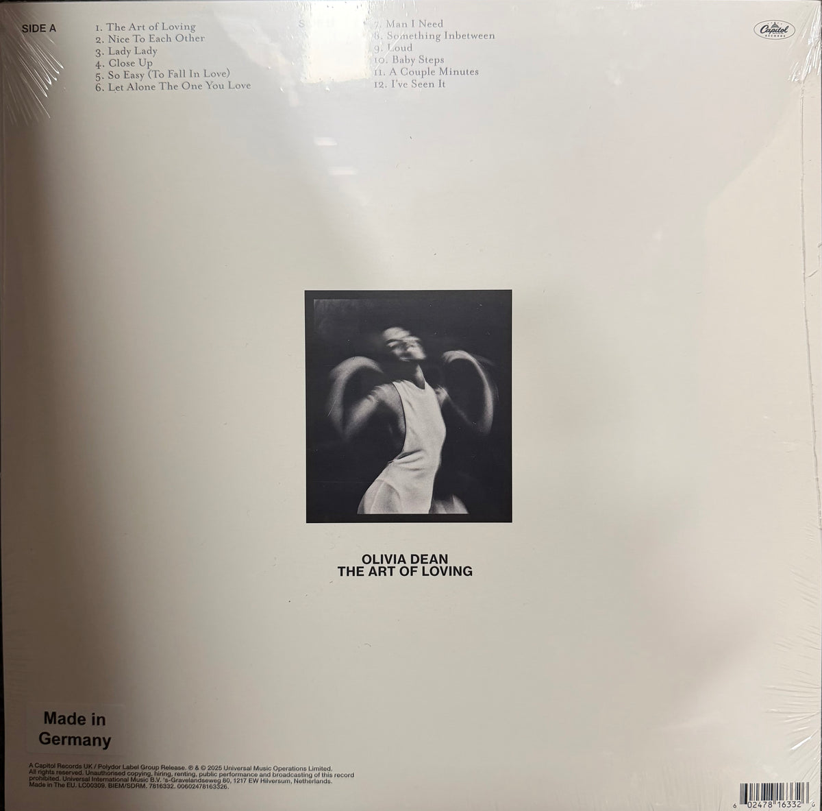 Vinyl record sleeve with black and white photo of a woman and text on a beige background