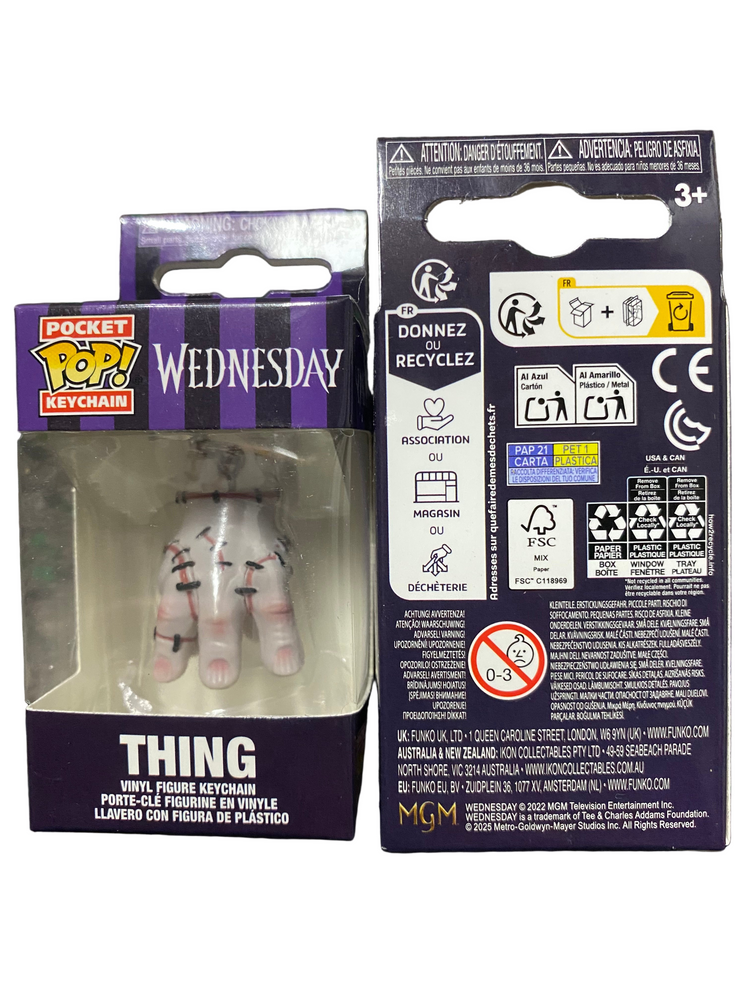 Keychain packaging with 'Wednesday' character from 'The Addams Family' on a white background