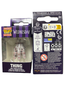 Keychain packaging with 'Wednesday' character from 'The Addams Family' on a white background