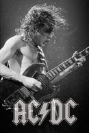Black and white photo of a guitar player with AC/DC logo