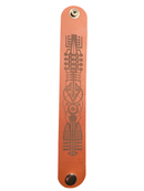 Leather Wristband  with embossed design on a white background