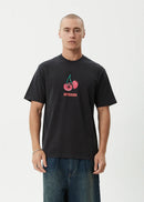 Man wearing a black t-shirt with a cherry graphic and 'Supreme' logo on a white background