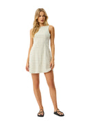 Woman wearing a white checkered dress on a white background