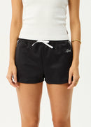 Black shorts with white drawstring and brand logo worn by a person on a white background