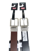 Two Levi's belts with different strap colors on a gray surface.
