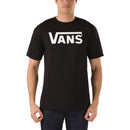 Person wearing a black Vans t-shirt on a white background