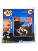 Funko Pop! vinyl figure packaging with a dragon and character on a gray surface