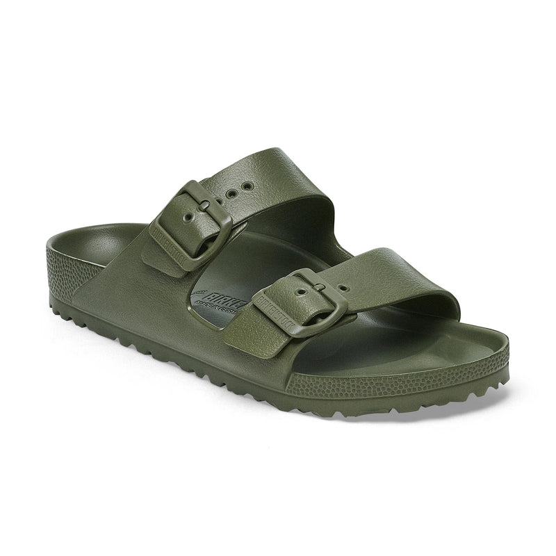 Green sandal with double buckle on a white background