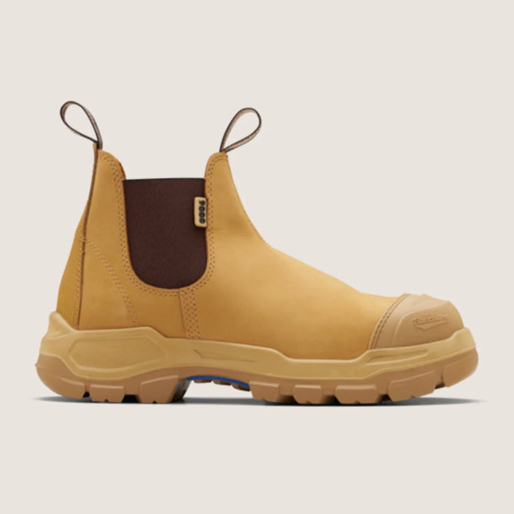 A pair of Blundstone 9000 Unisex RotoFlex Safety Boots in wheat color with elastic-sided design, steel toe cap, and rubber outsole.