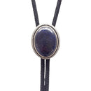 Bolo tie with a dark blue stone and silver metal on a white background