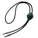 Bolo tie with green stone and silver clasp on a light gray background