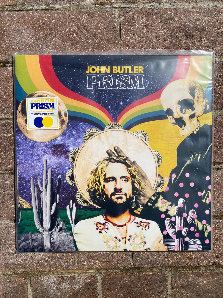 Vinyl record cover with artistic design and text on a textured surface