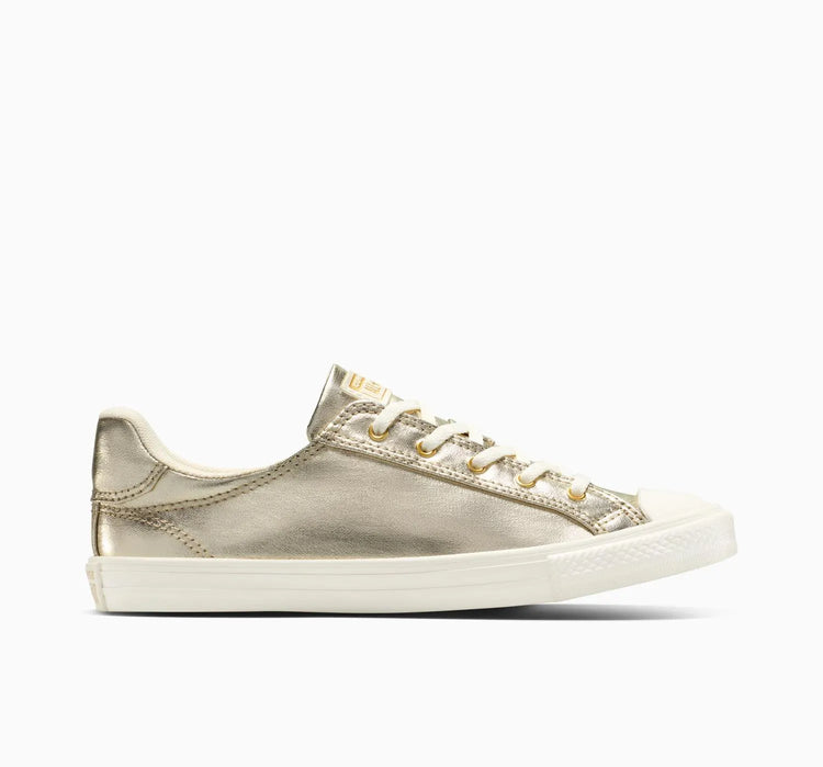 Gold sneaker with white sole on a white background