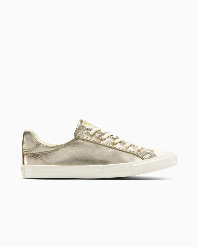 Gold and white sneaker on a white background