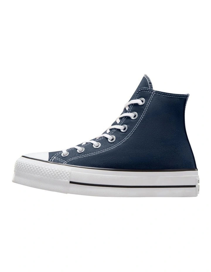 Navy blue high-top sneaker with white laces on a white background