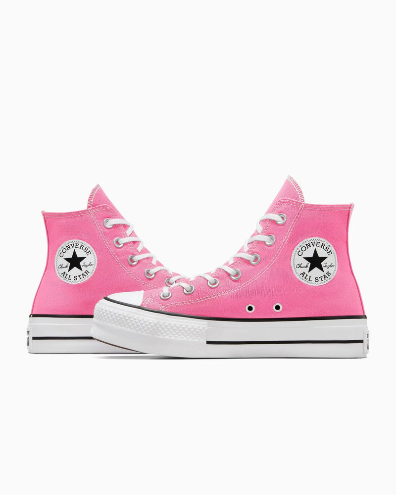 Pink high-top Converse All Star shoes on a white background