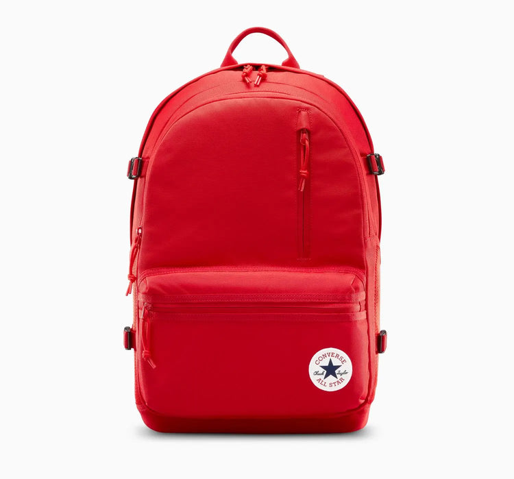 Red backpack with a visible brand logo on a white background