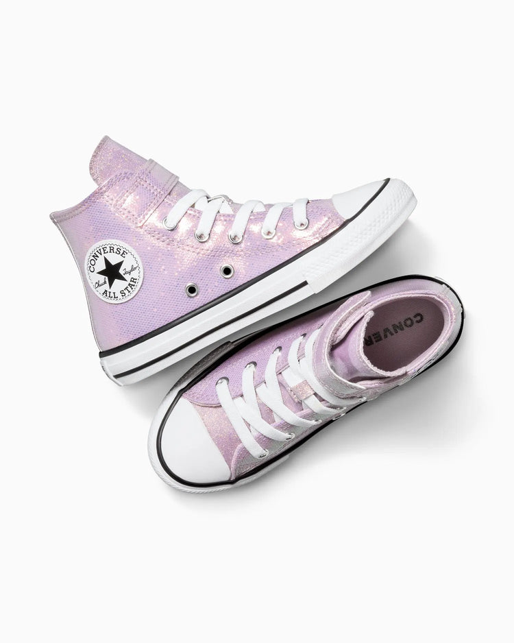 Pair of pink Converse sneakers on a white background