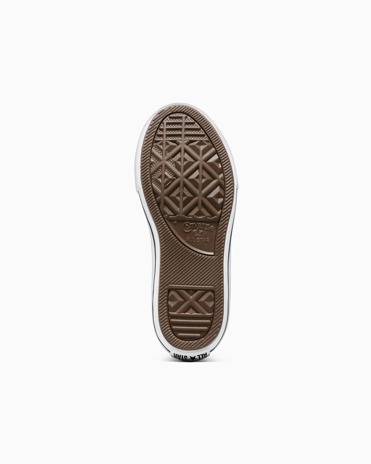 Close-up of a brown Converse shoe sole on a white background