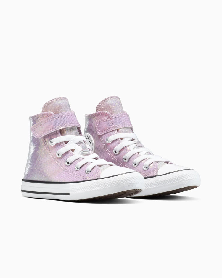 Close-up of a pink Converse high-top sneaker with white laces on a white background