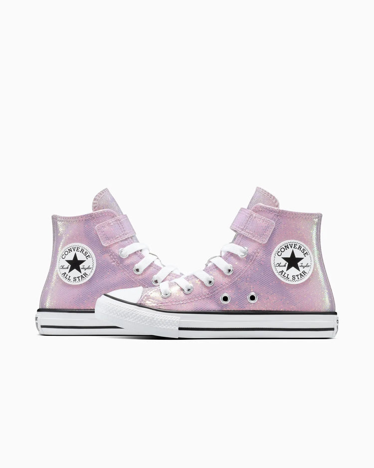 Close-up of a pink Converse high-top sneaker with white laces on a white background
