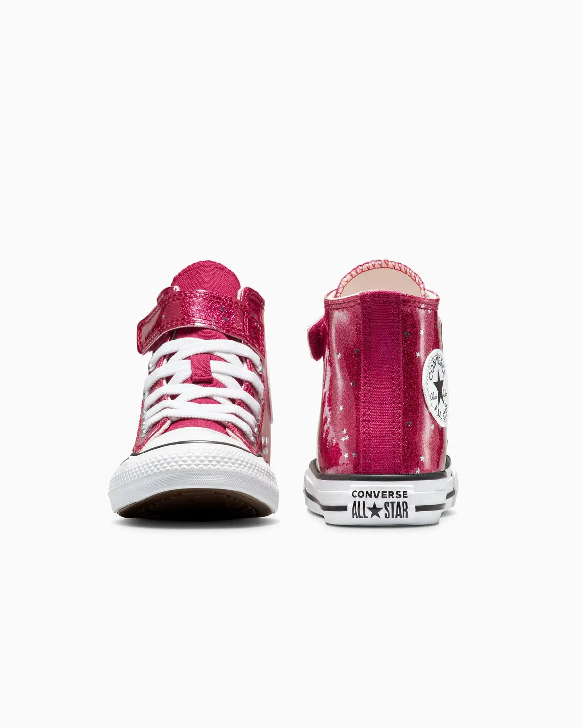 Pink high-top sneakers with white soles on a white background