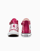 Pink high-top sneakers with white soles on a white background