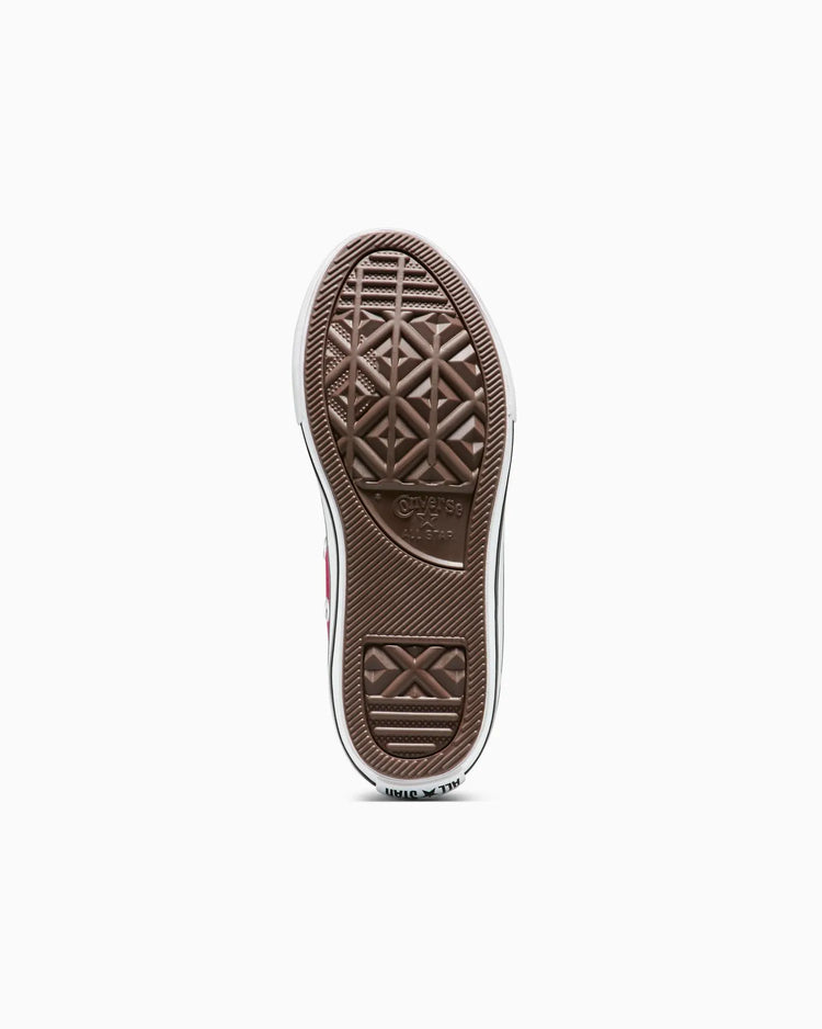 Brown shoe sole with tread pattern on a white background