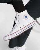 White Converse All Star high-top sneakers with red and blue accents on a white background