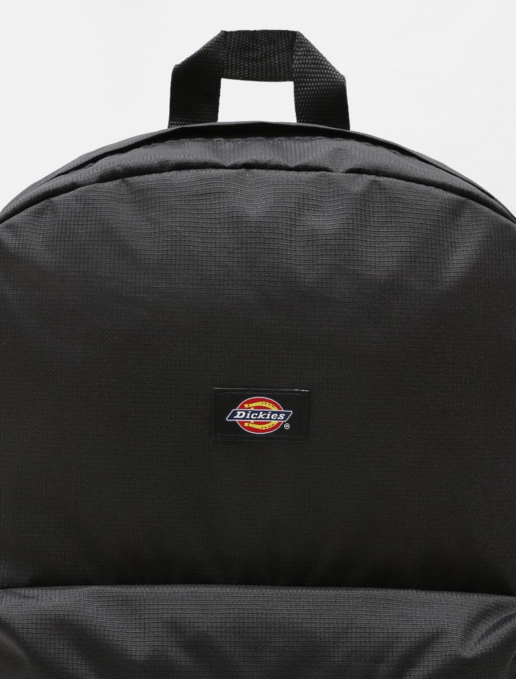 Black backpack with Dickies logo on a white background