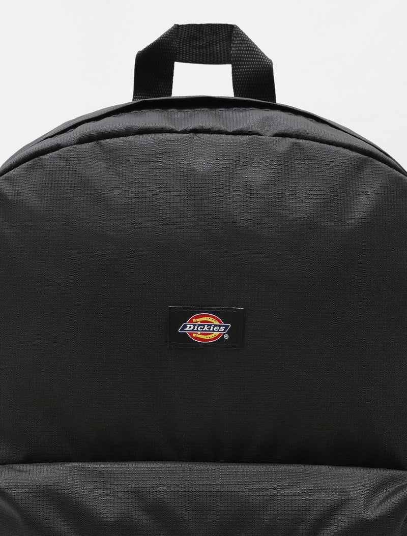 Black backpack with Dickies logo on a white background