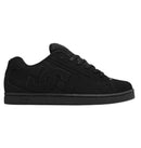 Black DC sneakers on a light gray background