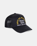 Black cap with yellow and white text on a light gray background