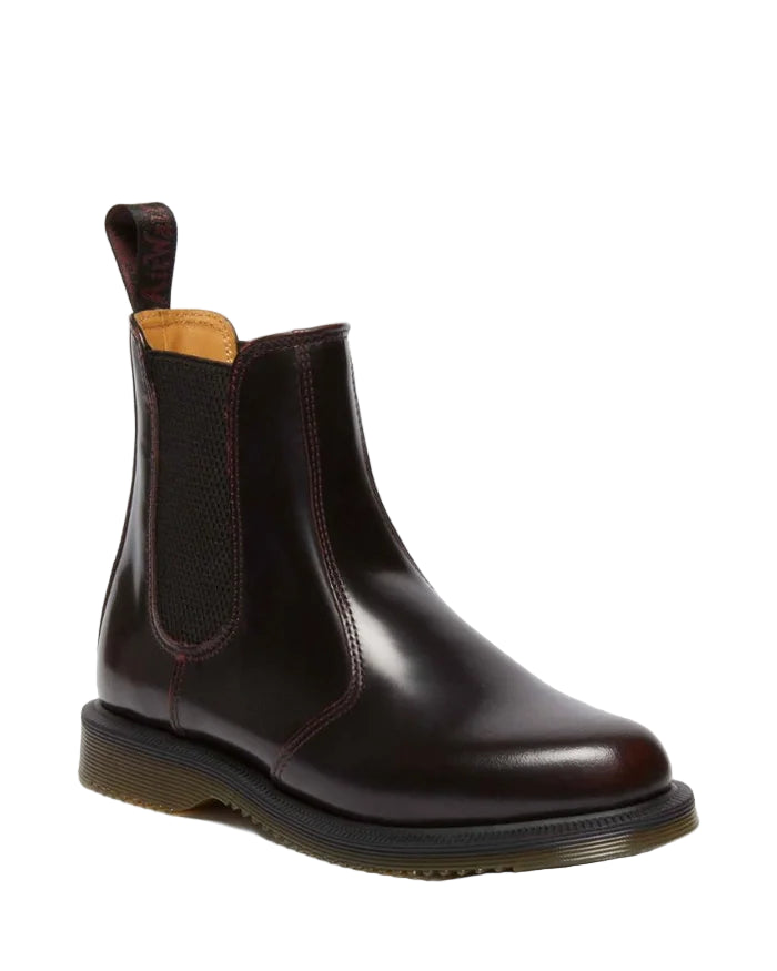 Brown leather Chelsea boot on a light gray background