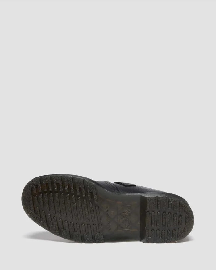 Black Dr Martens sole on a light gray background