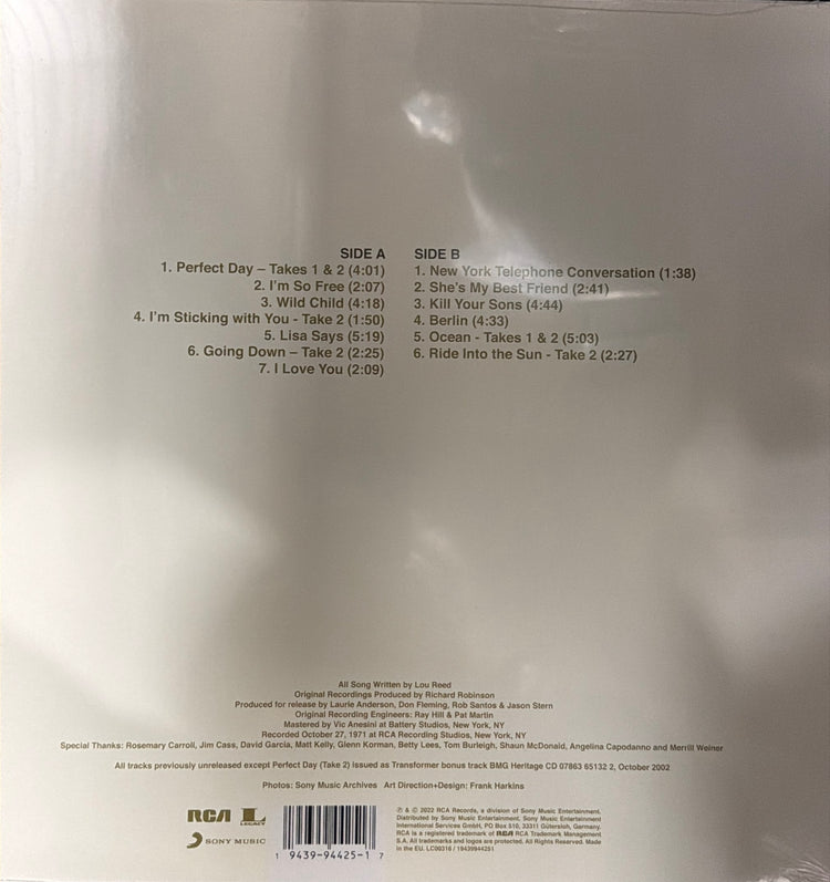 The back cover of a vinyl record sleeve for Low Road's 'Perfect Day' album, featuring the tracklist, barcode, and RCA logo on a plain light background.