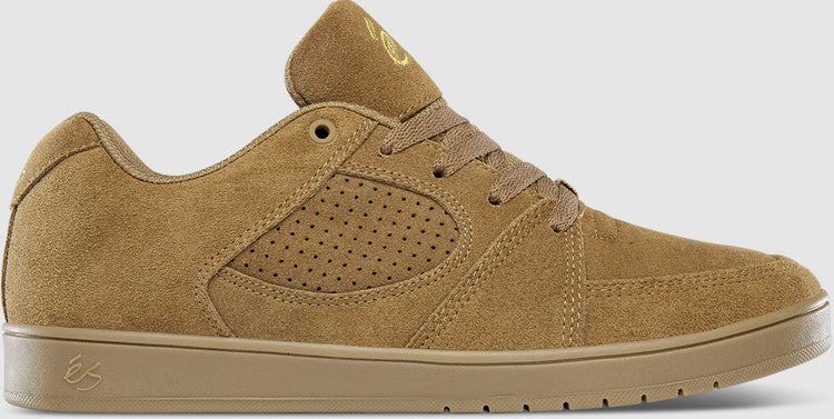 A brown suede skate shoe with lace-up closure and the éS brand logo on the tongue and heel.