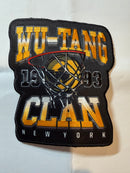 An embroidered patch featuring the text 'WU-TANG CLAN NEW YORK' with a basketball going through a hoop, on a black background.
