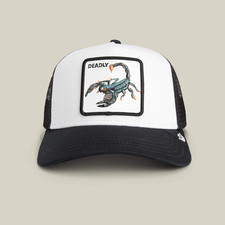 Trucker hat with scorpion design and 'DEADLY' text on a beige background