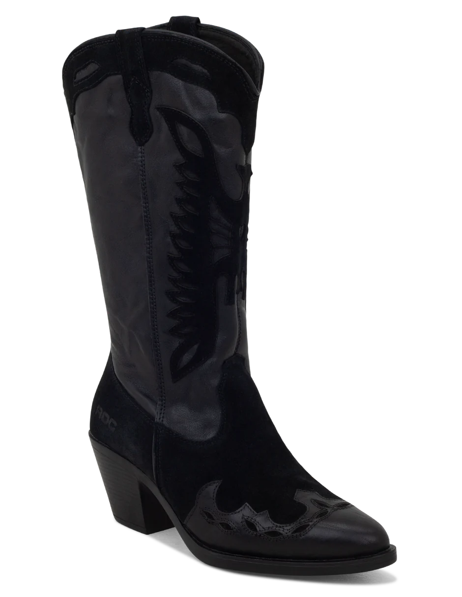 A black suede boot with a pointed toe, decorative suede leather overlays, and a low heel.