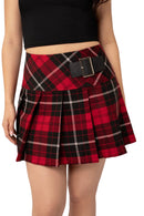 Red and black plaid skirt with a belt on a plain background