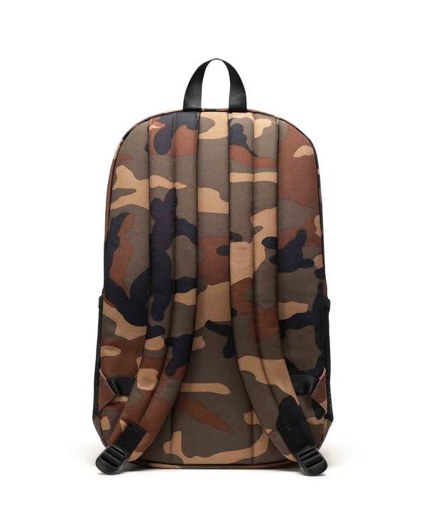 Camouflage-patterned backpack on a white background