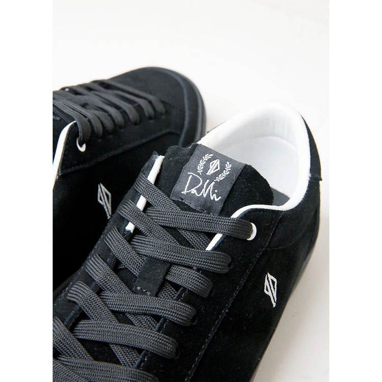 close up of hours is yours logo on top of shoe