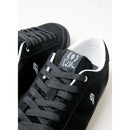 close up of hours is yours logo on top of shoe