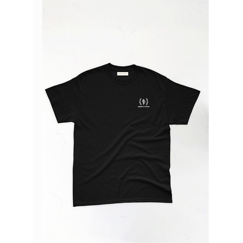 A black crew neck t-shirt laid out flat with a small logo on the upper left side.