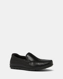 A single black loafer shoe with a rubber outsole, designed for casual wear.